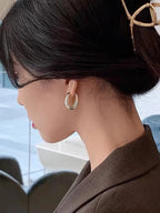 Polished Gold-Tone Oval Hoop Earrings for Everyday Wear