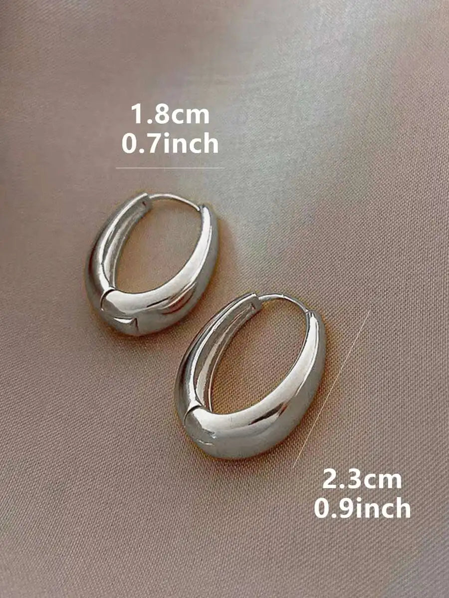 Polished Gold-Tone Oval Hoop Earrings for Everyday Wear