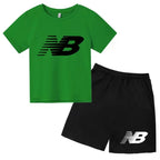 Two-piece kids' set: short-sleeve T-shirt and shorts with musical star print. Perfect for summer sports and trendy style, suitab